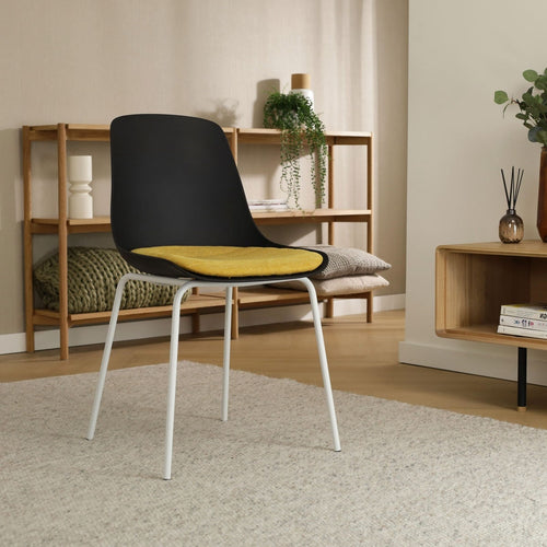 Nolon Nora-Liv Eetkamerstoel Zwart - Okergeel Kussen - Witte Poten - vtwonen shop