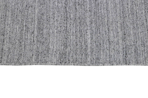 Laagpolig vloerkleed MOMO Rugs Nouveau Plain Light Grey 140x200 cm - vtwonen shop