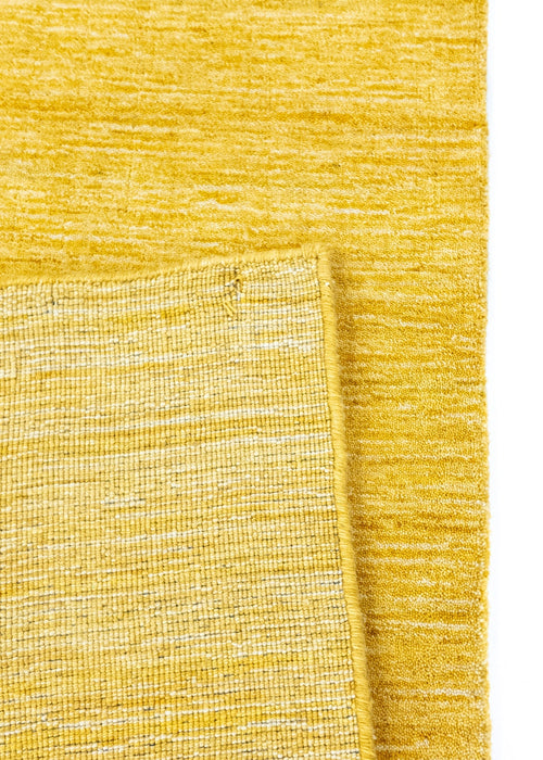 Vloerkleed MOMO Rugs Panorama Uni Gold 250x350 cm