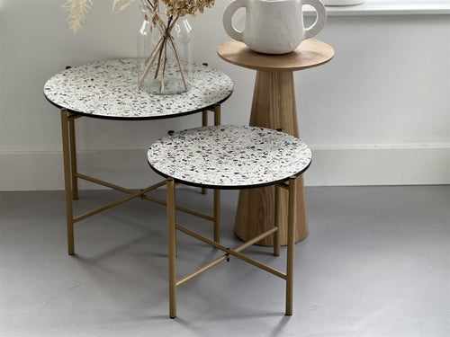 MaximaVida salontafel Lucca 49 cm kruisframe champagne goud - HPL terrazzo look - vtwonen shop