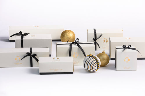 Dagmara kerstbal – glas – set van 2 – met een abstract patroon in goud-, brons- en kopertinten