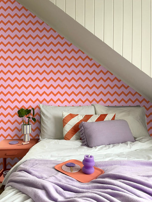ESTAhome behang zigzag motief oranje en roze - 50 x 900 cm - 131486