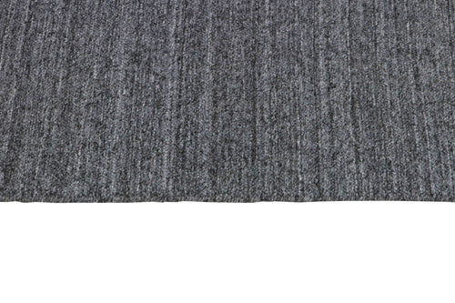 Laagpolig vloerkleed MOMO Rugs Nouveau Plain Dark Grey 140x200 cm - vtwonen shop