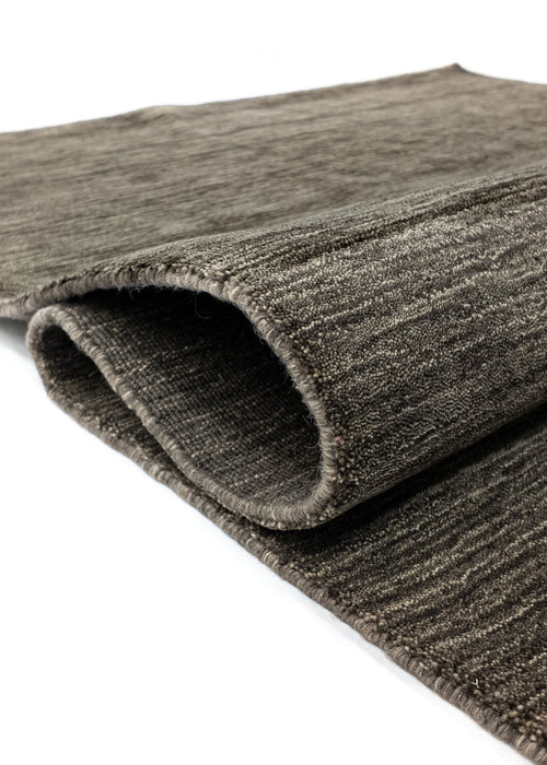 Vloerkleed MOMO Rugs Panorama Uni Dark Brown 80x200 cm