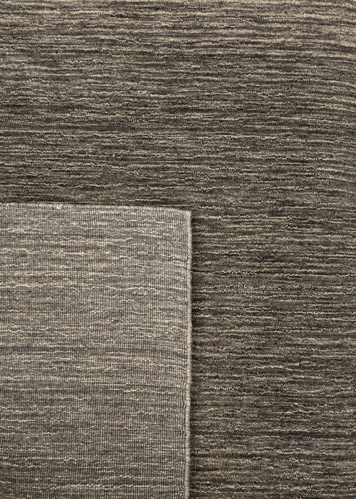 Vloerkleed MOMO Rugs Panorama Uni Dark Brown 90x160 cm