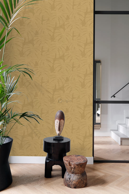 Origin Wallcoverings behang tropische bladeren okergeel - 50 x 900 cm - 347811 - vtwonen shop