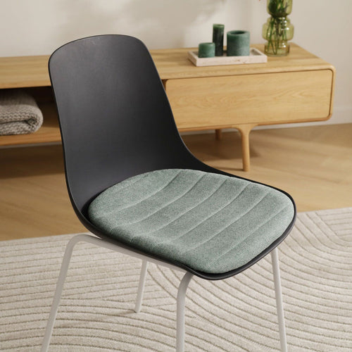 Nolon Nora-Liv Eetkamerstoel Zwart - Zacht Groen Kussen - Witte Poten - vtwonen shop