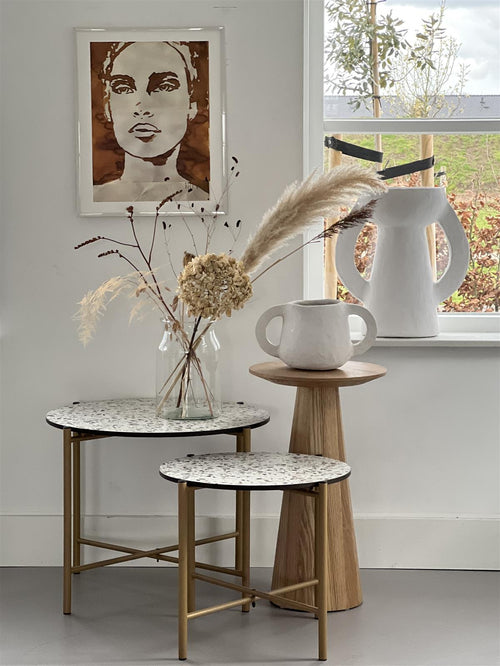 MaximaVida salontafel Lucca 49 cm kruisframe champagne goud - HPL terrazzo look - vtwonen shop