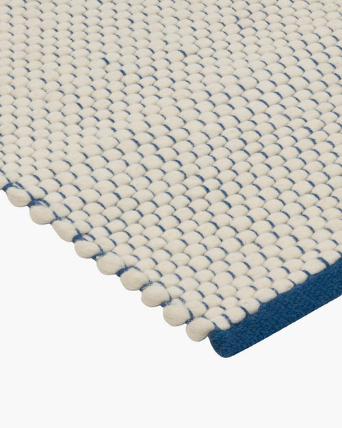 noo.ma handgeweven vloerkleed van Nieuw-Zeelandse wol - laagpolig, gestructureerd, rechthoekig